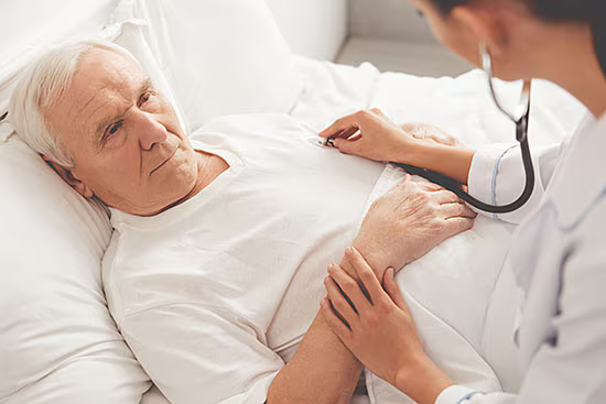 doctor with old patient